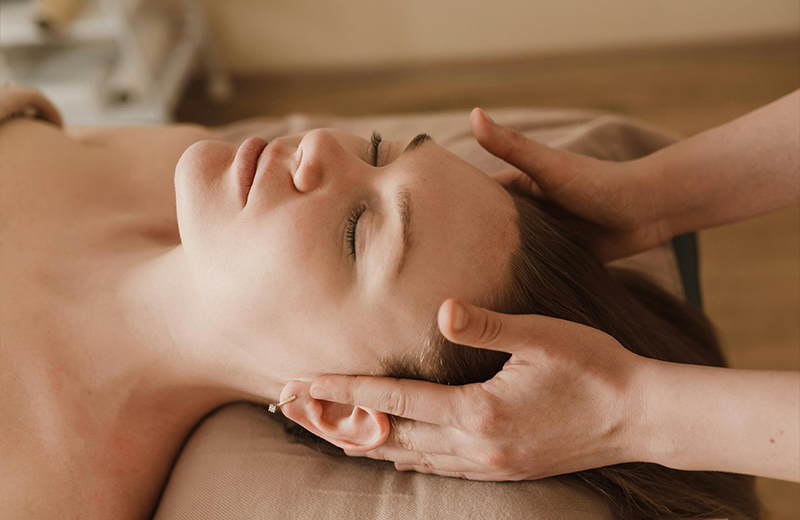 Lovely Skin and Beauty - Brisbane - A woman enjoying a luxurious energizing facial massage, designed to refresh and revitalize her skin in a serene spa setting. - Energise Facial