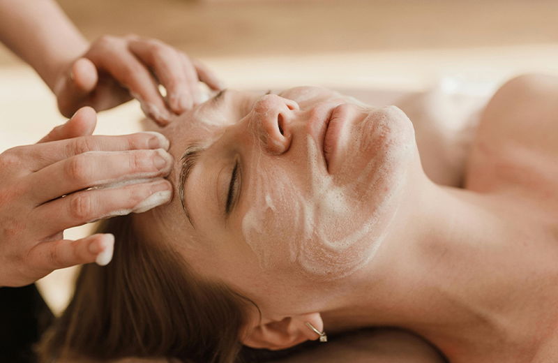 Lovely Skin and Beauty - Brisbane - A woman receiving a rejuvenating facial therapy in a luxurious spa, enjoying a relaxing and revitalizing experience. - Face Pamper