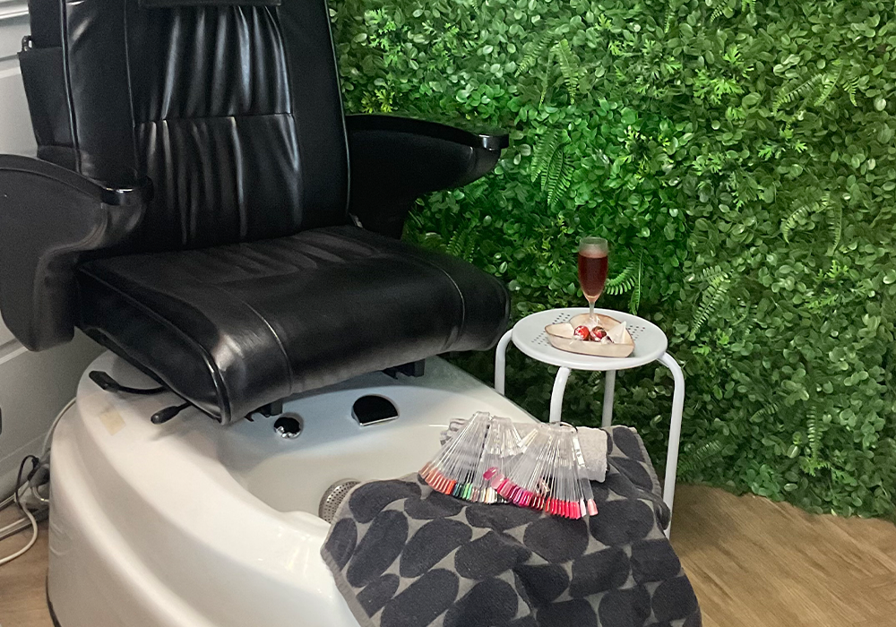 Lovely Skin and Beauty19 Lovely Skin and Beauty - Brisbane - A luxurious massage chair where guests enjoy a relaxing foot massage while sipping wine and indulging in chocolates for the ultimate pampering experience.