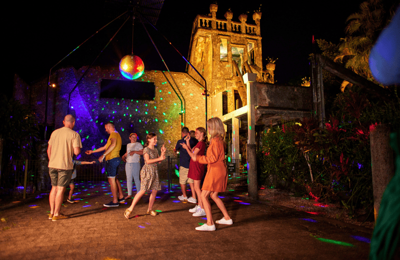 Paronella Park at night where guests of Far North Escapes can dance beside the castle